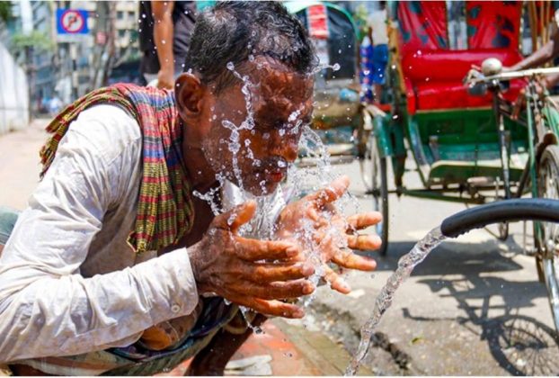 Excess heat people washing face